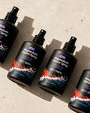 Salt + Earth Co. Magnesium Dream Sprays laying flay on sandstone