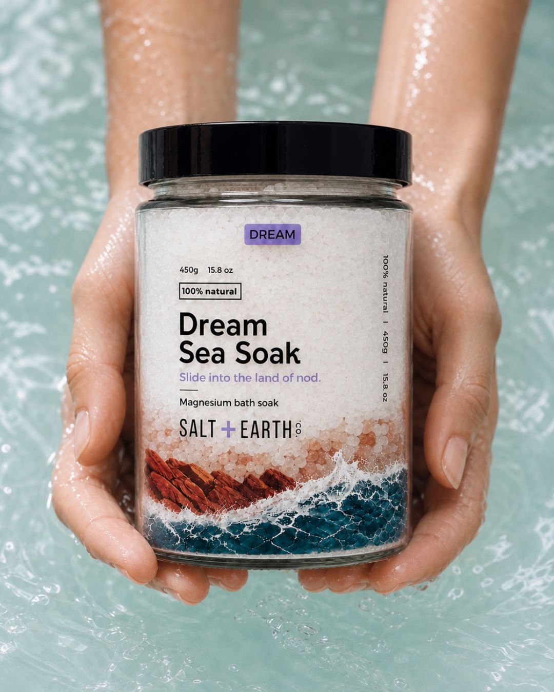 Salt + Earth Co Dream Sea Soak being held over water