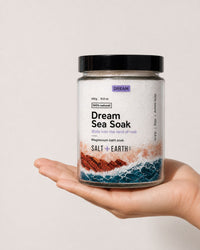 Salt + Earth Co Dream Sea Soak sitting on hand
